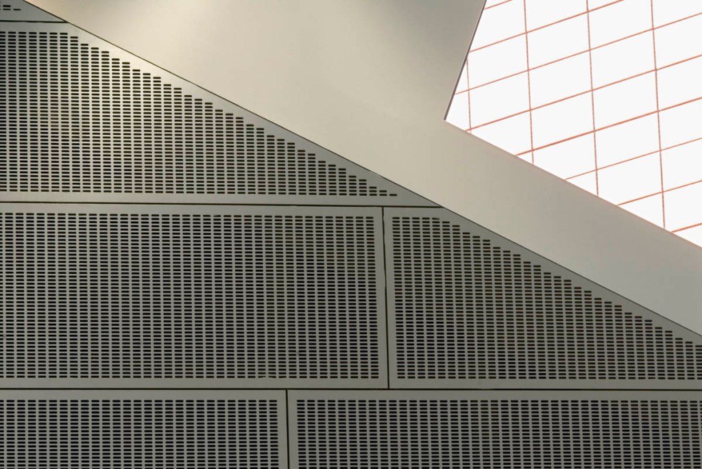 Gooding Aluminium perforated aluminium wall cladding panels at Pimlico Academy for Westminster City Council. Architecture PLB for Building Schools for the Future (BSF) Programme.